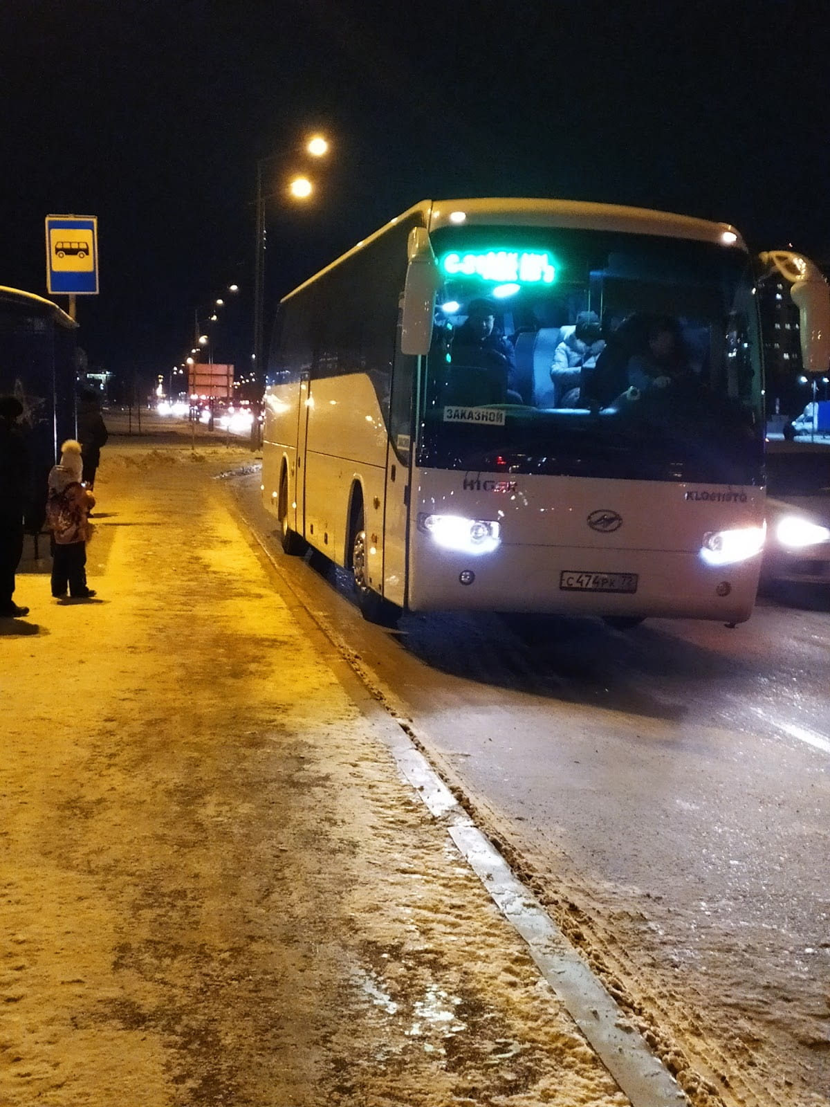 Buses take the workers to the plant